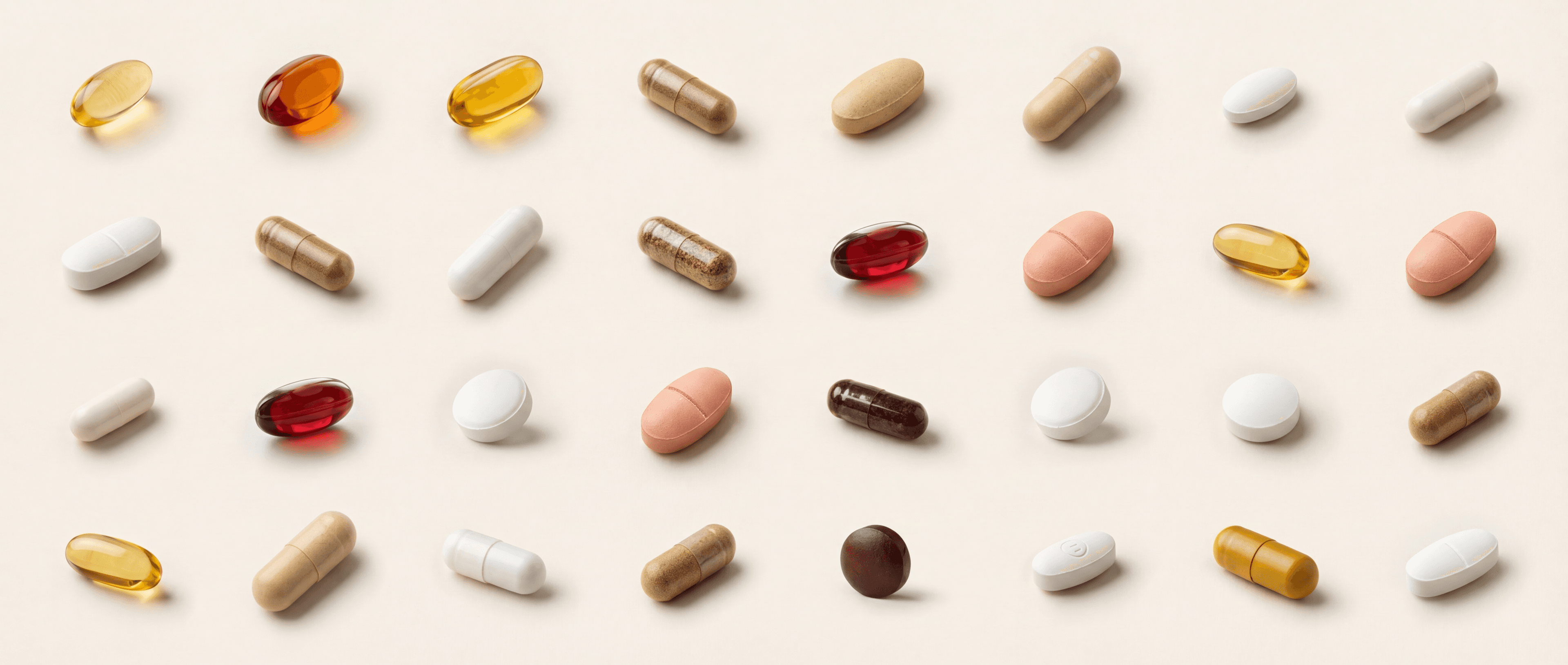 Grid of supplement capsules and softgels